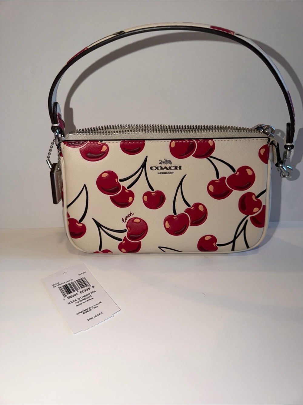 COACH New Cream Leather Small Wristlet with Red Cherry Print